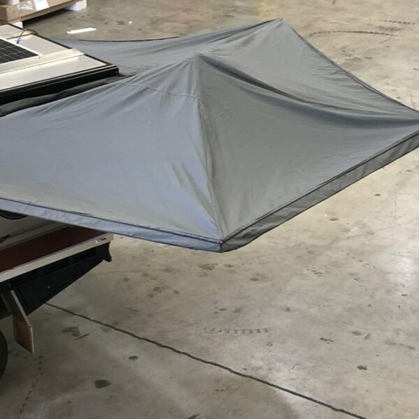 Image of Ostrich Wing Awning setup on 4x4 Vehicle
