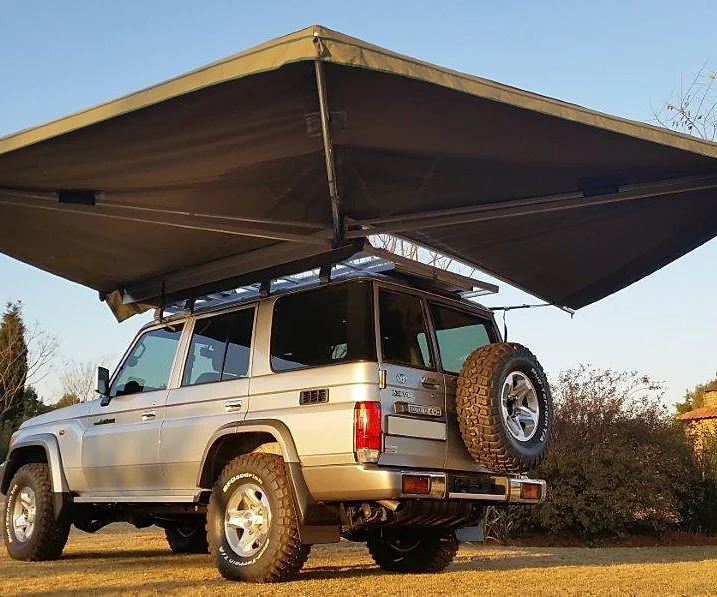 Ostrich Wing Awning Setup on 4x4 Vehicle